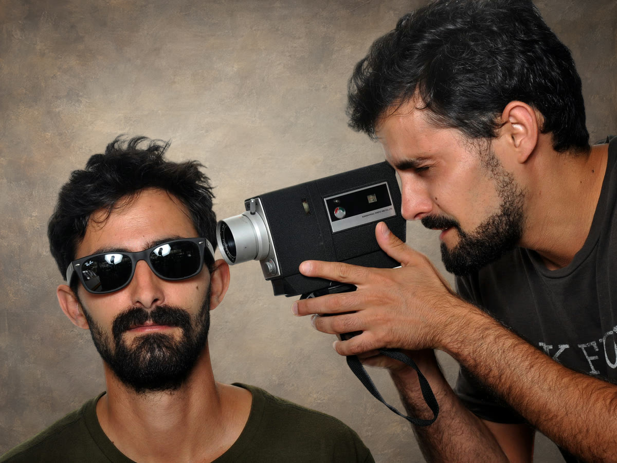 My twin brother Yuval and me with an old film camera